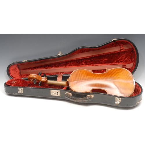 3728 - A violin, the one-piece back 36cm long excluding button, ebonised tuning pegs, outlined throughout w... 