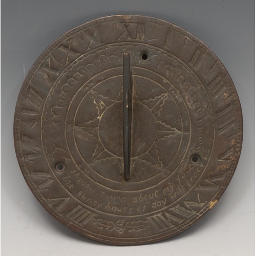 3273 - An early 20th century bronze circular sundial, Roman numerals, inscribed Shadow round about my face/... 