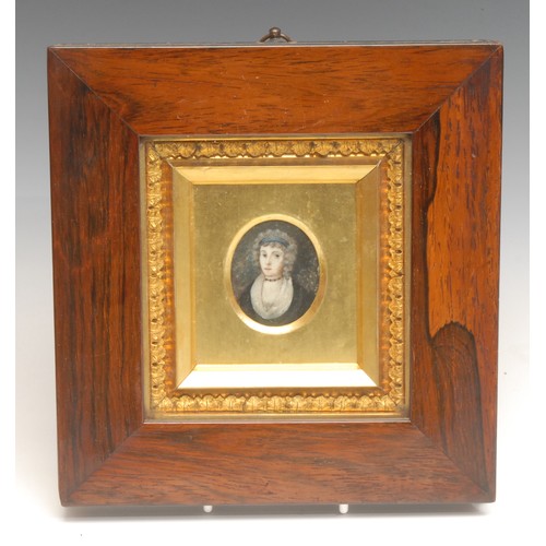 4099 - English School (19th century), a portrait miniature, of a lady wearing a black dress, a blue ribbon ... 