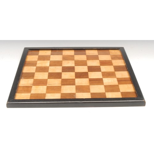 3304 - An early 20th century parquetry chess board, ebonised border, 42cm x 42cm