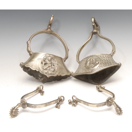 4047 - Equestrian and South American Interest - A pair of South American spurs, cast with floral patterns, ... 