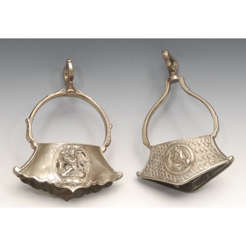 4047 - Equestrian and South American Interest - A pair of South American spurs, cast with floral patterns, ... 