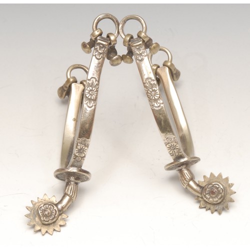 4047 - Equestrian and South American Interest - A pair of South American spurs, cast with floral patterns, ... 