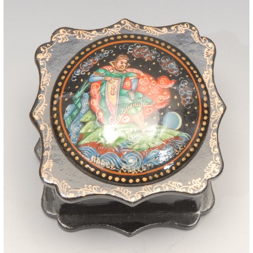 3181 - A Russian black lacquer rounded rectangular snuff box, printed and painted with a milk maid, 8cm, pr... 