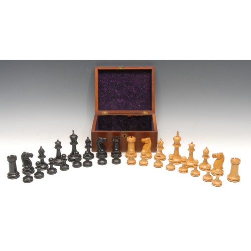 3018 - A boxwood and ebonised Staunton pattern tournament chess set, weighted bases, the Kings 10cm high, m... 
