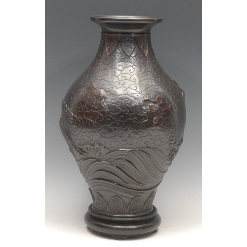 3407 - Genryusai Seiya (1868-1912), a Japanese dark patinated bronze ovoid vase, cast in relief with cranes... 