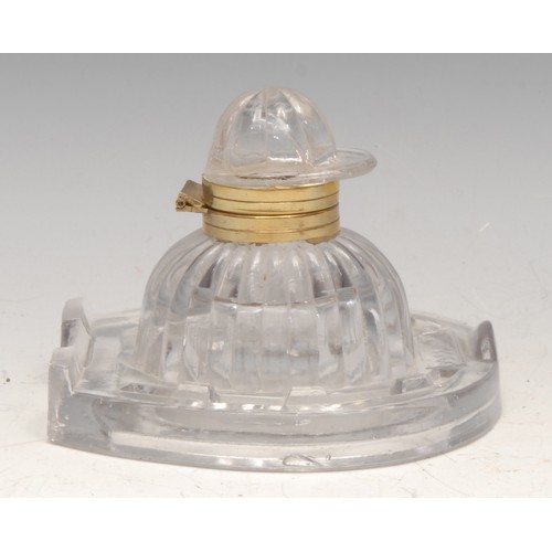 3219 - A Victorian pressed glass inkwell, of equestrian interest, the cover as a jockey’s cap, Rd. No. 9516... 