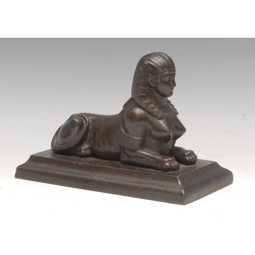 3544 - A 19th century cast iron library model, of a Sphinx, after the Ancient Egyptian in the Grand Tour ta... 