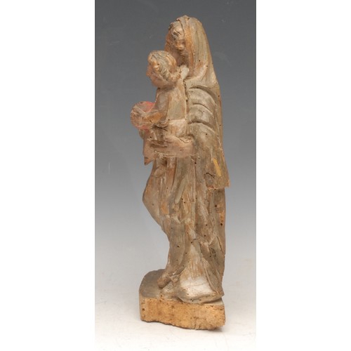 3009 - A Baroque polychrome painted softwood figure, carved as the Madonna and Child, 33cm high, 17th/18th ... 