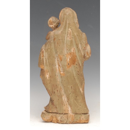 3009 - A Baroque polychrome painted softwood figure, carved as the Madonna and Child, 33cm high, 17th/18th ... 