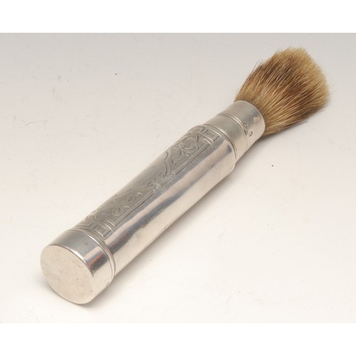 3223 - A Victorian silver travelling shaving brush, the tube engraved with Gothic leafy strapwork, 8.5cm lo... 