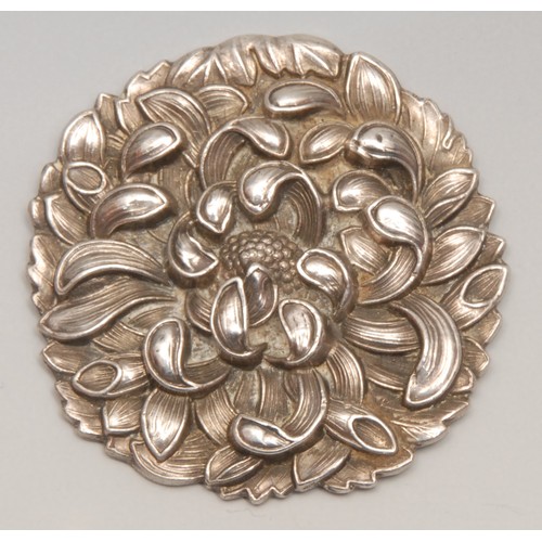 3089 - A Japanese silver buckle, as a chrysanthemum, 5cm diam, character mark; another, Komai damascene (2)