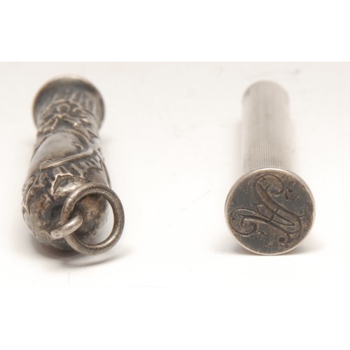 3310 - An early 20th century silver coloured metal combination propelling pencil and desk seal, 6cm long