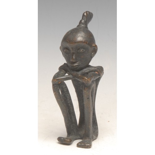 3636 - A dark patinated bronze stylised figure, sat hunched hugging their knees, 11cm, apparently unmarked