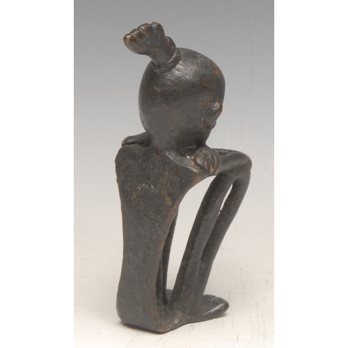 3636 - A dark patinated bronze stylised figure, sat hunched hugging their knees, 11cm, apparently unmarked