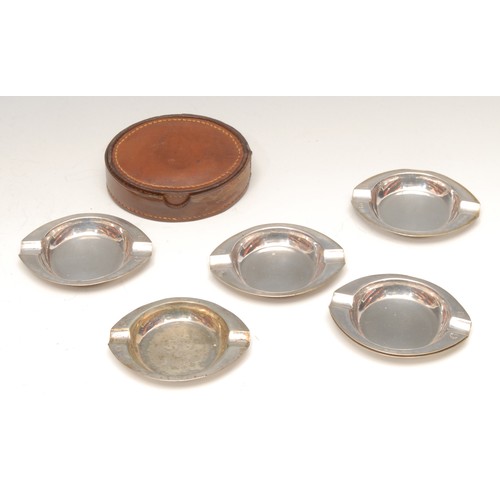 3684 - A set of six German silver stacking oval ashtrays, 7cm wide, marked with crescent, crown and 800, 93... 