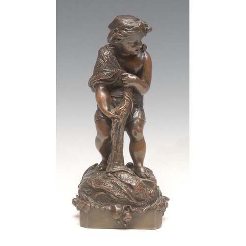 3638 - A French patinated bronze, of a fisher boy, he stands with net draped over shoulder, wearing shorts ... 