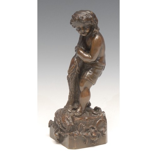 3638 - A French patinated bronze, of a fisher boy, he stands with net draped over shoulder, wearing shorts ... 