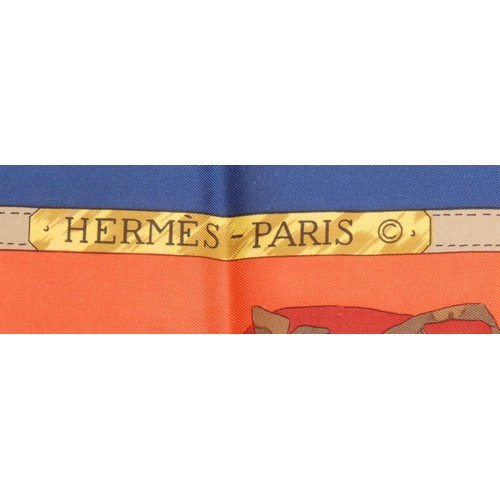 3620 - An Hermes silk scarf, Hong Kong Jockey Club, designed by Ledoux, printed with jockey caps and stirru... 