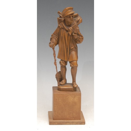 3077 - A German figure, of a huntsman, he stands, smoking a meerschaum pipe, his game basket on his back, s... 