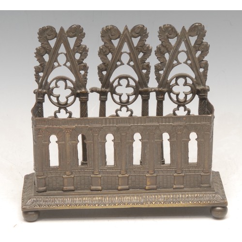 3177 - A post-Regency dark patinated bronze desk top visiting card or letter rack, in the Gothic Revival ta... 