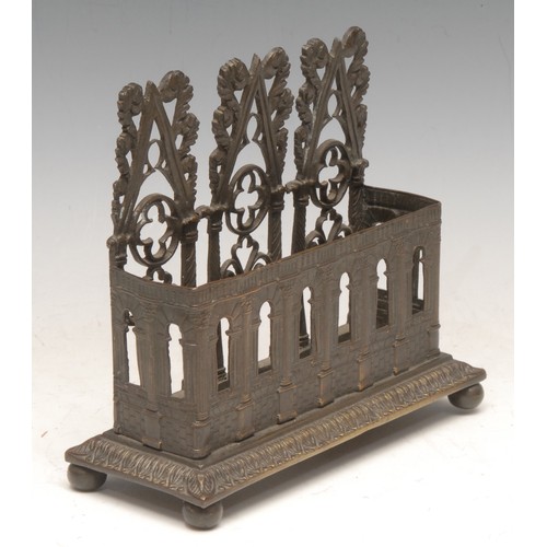 3177 - A post-Regency dark patinated bronze desk top visiting card or letter rack, in the Gothic Revival ta... 