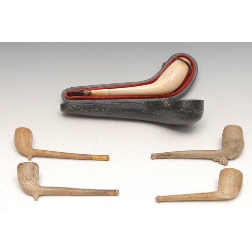 3078 - A German meerschaum pipe, hinged cover, 18cm long, c.1900, cased; 19th century clay pipes (5)