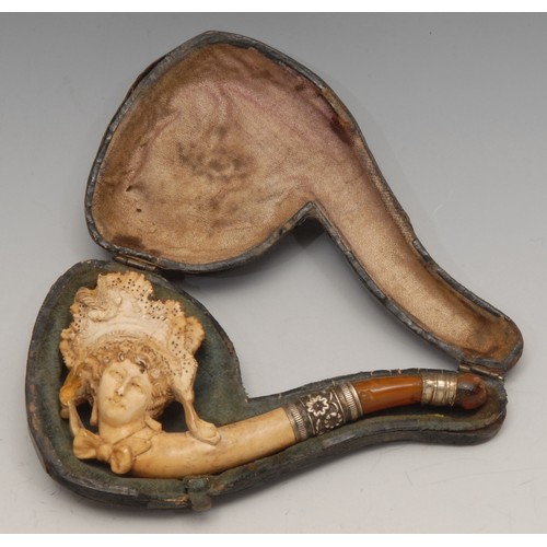 3578 - A 19th century German novelty meerschaum pipe, carved as the head of a lady, dressed a la mode, 10.5... 