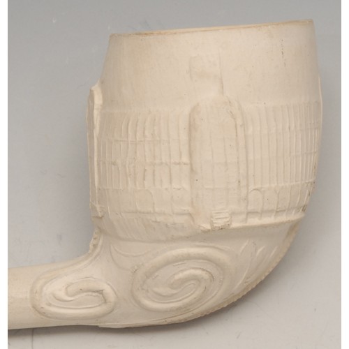 3487 - The Great Exhibition - a large clay pipe, moulded with a view of the Crystal Palace, 19cm long; anot... 