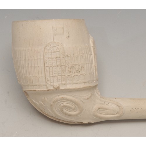 3487 - The Great Exhibition - a large clay pipe, moulded with a view of the Crystal Palace, 19cm long; anot... 