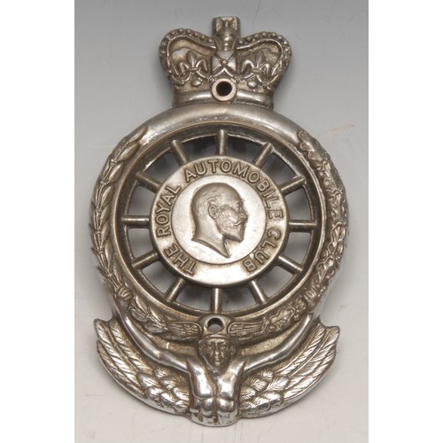 3350 - Automobilia - a George V car badge, The Royal Automobile Club [RAC], 12cm long; another, brass; anot... 