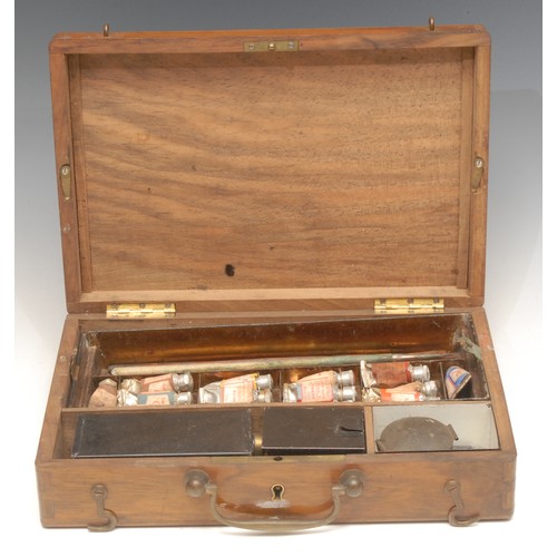 3317 - An early 20th century walnut travelling artist's box, hinged cover enclosing a fitted interior, 24.5... 