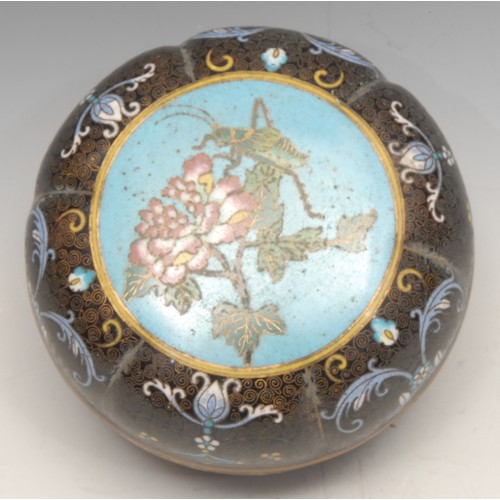 3030 - A Chinese cloisonne enamel lobed circular box and cover, decorated with a grasshoper, flowers, folia... 