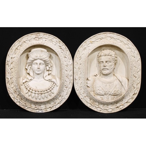 3130 - A pair of 19th century architectural softwood wall plaques, carved as Marcus Aurelius and Faustina t... 