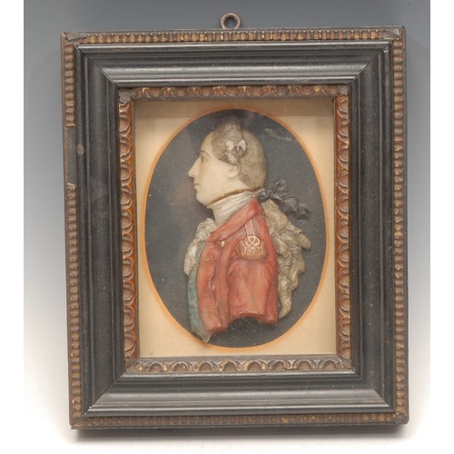 3073 - A George III wax portrait, of a military officer, in uniform, half-length facing to dexter, broad Ho... 
