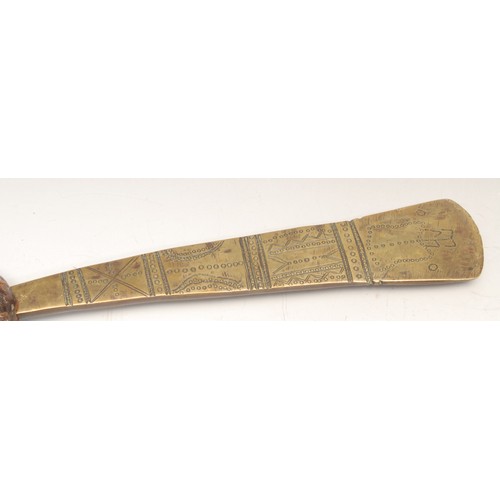 3512 - Tribal Art - an African axe, brass blade chased with geometric motifs, leather bound haft, 46cm long... 