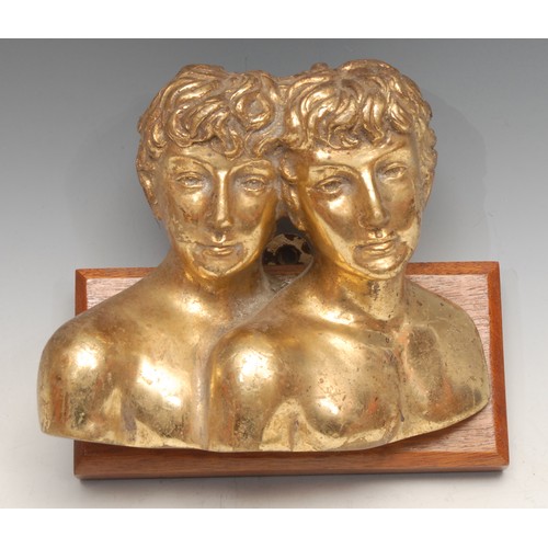 3346 - Astrology - a gilt metal wall applique, cast as a bust-length representation of twins, in allusion t... 