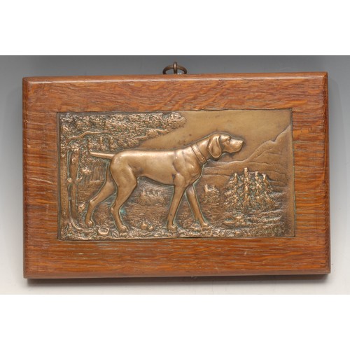 3413 - H Henjes (early 20th century), a bronze relief plaque, cast with a hunting dog in a landscape, signe... 