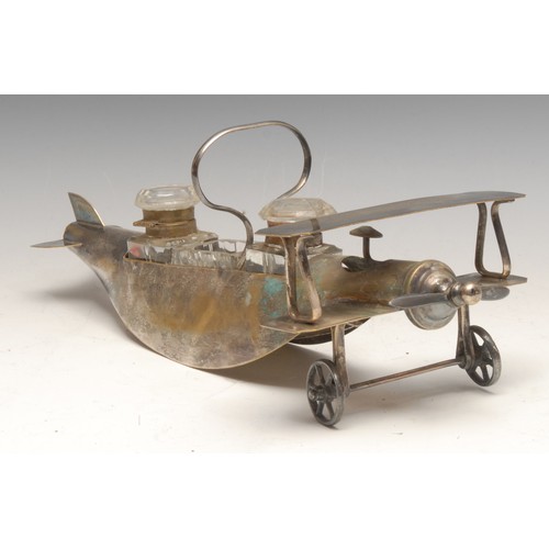 3281 - An early 20th century E.P.N.S novelty inkstand or cruet, as a bi-plane, 32cm long