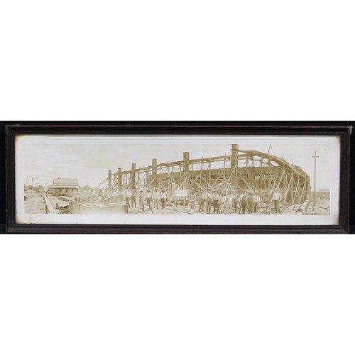 4066 - Photography - America - an early 20th century panoramic group photograph, of a construction site, th... 