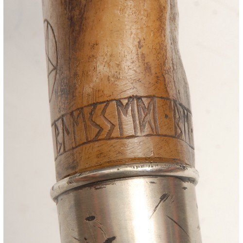 3710 - Mysticism & The Occult - a walking stick, the handle a mounted section of bone scrimshaw engraved wi... 