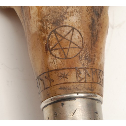 3710 - Mysticism & The Occult - a walking stick, the handle a mounted section of bone scrimshaw engraved wi... 