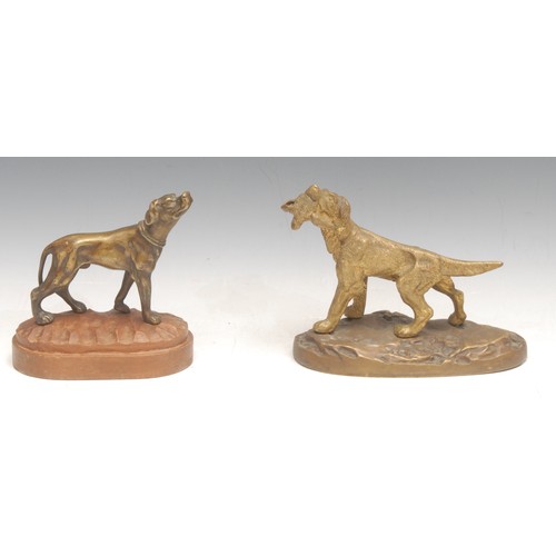 3536 - A 19th century bronze figure of a pointing dog, holding a game bird between its teeth, cast metal ba... 