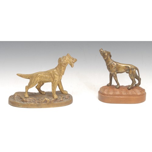 3536 - A 19th century bronze figure of a pointing dog, holding a game bird between its teeth, cast metal ba... 