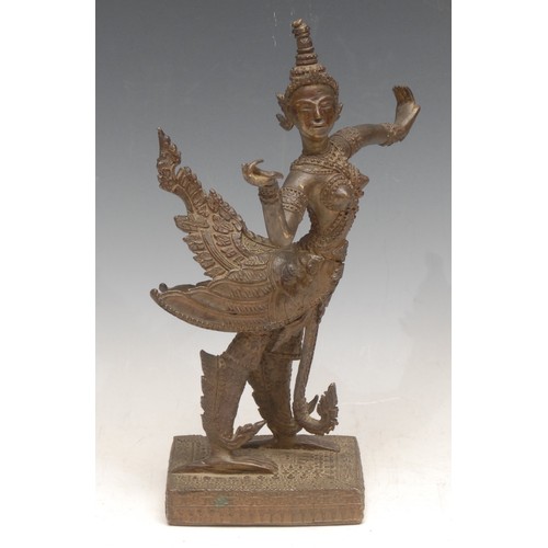 3255 - An Asian bronze figurine of Garuda, the divine vehicle of Vishnu, with relaxed wings, on a stone bas... 