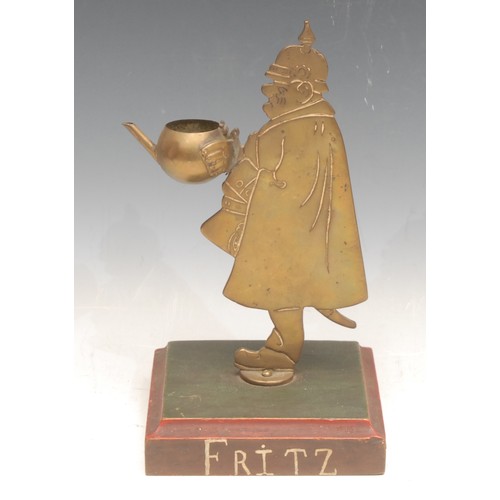 3473 - Pipes and Smoking - An early/mid 20th century novelty brass dummy board ember holder, as a German so... 