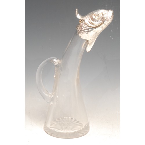 3655 - An early 20th century claret jug, mounted with a white metal collar and cover as a fish head, loop h... 