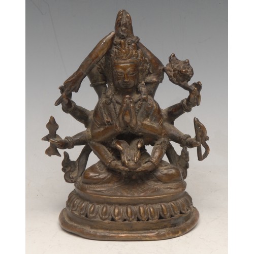 3467 - Nepalese School (early 20th century), a patinated bronze, bodhisattva Manjushree, pierced lotus base... 