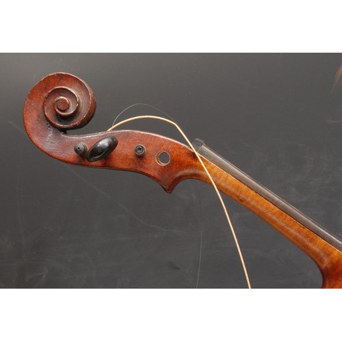 3727 - A violin, the one piece back 35.5cm long excluding button, paper label printed Celebre Vosgien, ebon... 