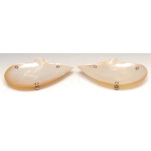 3495 - The Wunderkammer - a pair of silver coloured metal mounted mother of pearl dishes, ball feet, 22cm w... 